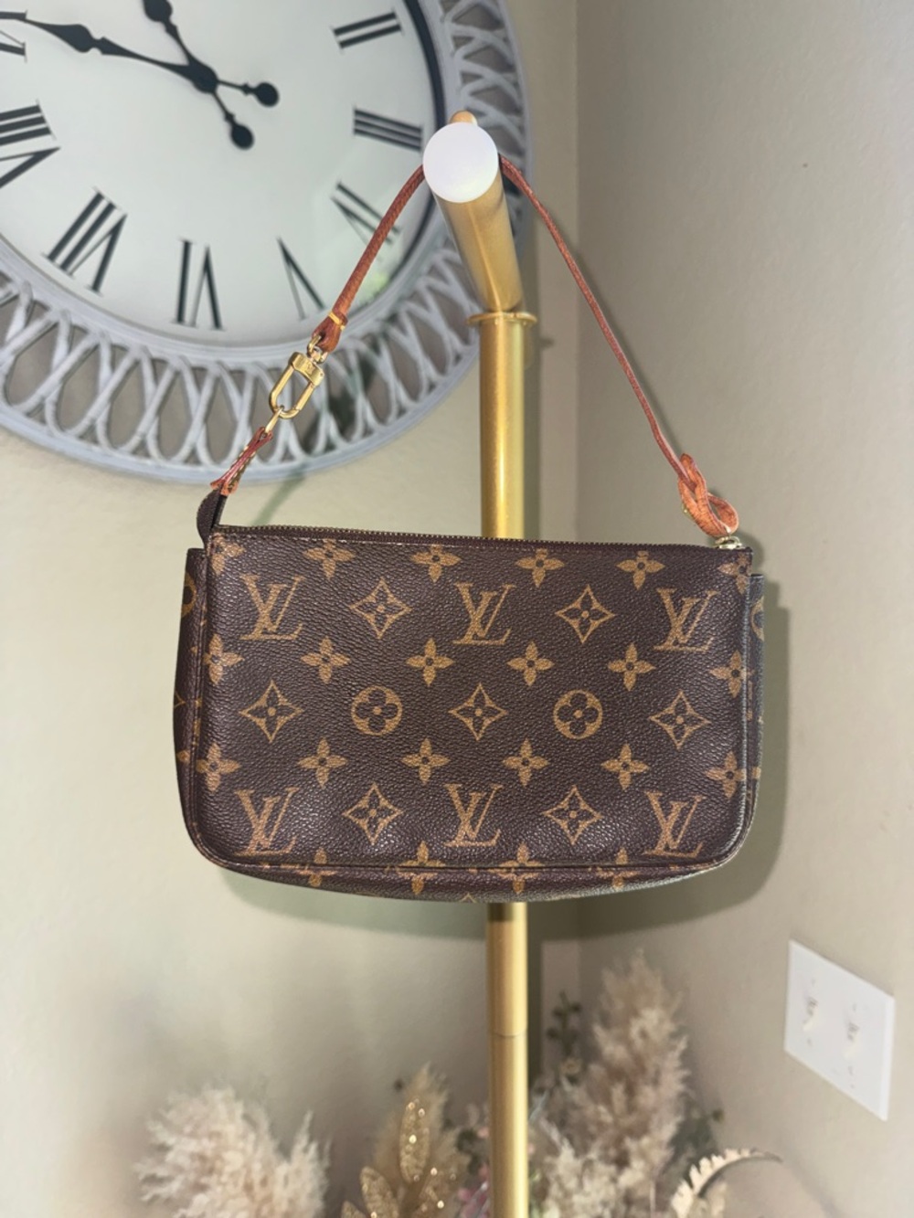 Louis Vuitton Monogram shoulder bag pouch.